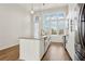 Modern kitchen with white cabinets and island at 457 Parkway Ne Dr, Atlanta, GA 30308