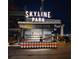 Night view of Skyline Park's welcome kiosk with various activities at 457 Parkway Ne Dr, Atlanta, GA 30308
