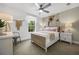 Bright bedroom featuring a comfortable bed and stylish decor at 344 Foxglove Way, Mcdonough, GA 30253