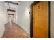 Brick hallway with exposed beams and apartment door at 350 Peters Sw St # 3, Atlanta, GA 30313