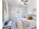 Bright bedroom with a queen-size bed, large window, and tasteful decor at 3794 Jack Vernon Cir, Powder Springs, GA 30127