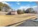 Large backyard with shed and wooden fence at 2210 Lisa Se Dr, Marietta, GA 30067