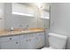 Clean bathroom featuring a vanity with storage and a toilet at 2210 Lisa Se Dr, Marietta, GA 30067