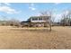 Two-story house with a brick facade and a large yard at 2210 Lisa Se Dr, Marietta, GA 30067