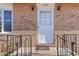 Front entrance with a white door and black railings at 2210 Lisa Se Dr, Marietta, GA 30067