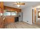 Bright kitchen with wood cabinets, granite countertops, and stainless steel appliances at 2210 Lisa Se Dr, Marietta, GA 30067