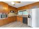 Bright kitchen with wood cabinets, granite countertops, and stainless steel appliances at 2210 Lisa Se Dr, Marietta, GA 30067