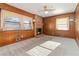 Spacious living room with a brick fireplace and wood paneling at 2210 Lisa Se Dr, Marietta, GA 30067