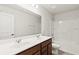 Bathroom with a double vanity, tub and shower at 300 Foxglove Way, Mcdonough, GA 30253