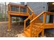A two-story deck in the backyard at 296 Grist Mill Ln, Lawrenceville, GA 30046