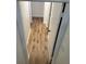 Hallway featuring wood flooring and white trim and doors at 296 Grist Mill Ln, Lawrenceville, GA 30046