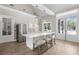 Modern clubhouse kitchen featuring stainless steel appliances and a large island at 440 Dahlia St, Mcdonough, GA 30253