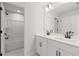 Bathroom features double sinks, vanity, and a shower-tub combo at 715 Crossroad Ct, Powder Springs, GA 30127