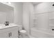 Bathroom featuring a vanity, toilet, and a shower-tub combo at 715 Crossroad Ct, Powder Springs, GA 30127