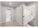 Spacious closet with wire shelving providing efficient storage solutions, along with entry to the ensuite bathroom at 715 Crossroad Ct, Powder Springs, GA 30127