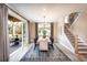Bright dining room with hardwood floors and sliding glass doors at 715 Crossroad Ct, Powder Springs, GA 30127
