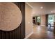 Bright entryway with hardwood floors and view into the living room at 715 Crossroad Ct, Powder Springs, GA 30127