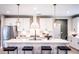 White kitchen with large island and quartz countertops at 715 Crossroad Ct, Powder Springs, GA 30127