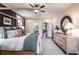 Luxurious main bedroom with a king-size bed and plenty of natural light at 715 Crossroad Ct, Powder Springs, GA 30127