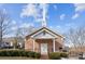 Brick church with steeple, landscaping, and steps at 193 Gibson St, Atlanta, GA 30316