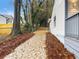 Walkway leads to a home with pine straw landscaping at 2068 Verbena Nw St, Atlanta, GA 30314