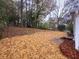 Large backyard with straw ground cover at 2068 Verbena Nw St, Atlanta, GA 30314