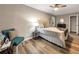 Bedroom with ceiling fan and plush bedding at 2068 Verbena Nw St, Atlanta, GA 30314