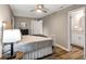 Main bedroom with a queen-size bed, plenty of natural light, and an ensuite bath at 2068 Verbena Nw St, Atlanta, GA 30314