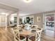 Bright dining room with hardwood floors and round table at 2068 Verbena Nw St, Atlanta, GA 30314
