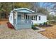Newly renovated house with a gray porch at 2068 Verbena Nw St, Atlanta, GA 30314