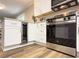Modern kitchen with stainless steel appliances and wine cooler at 2068 Verbena Nw St, Atlanta, GA 30314