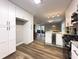 Renovated kitchen featuring white cabinets, granite countertops, and stainless steel appliances at 2068 Verbena Nw St, Atlanta, GA 30314