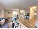 Open concept living area showcasing neutral decor and hardwood flooring at 2068 Verbena Nw St, Atlanta, GA 30314
