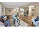 Open concept living area with hardwood floors and a view into the kitchen at 2068 Verbena Nw St, Atlanta, GA 30314