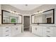 Bright bathroom featuring dual granite vanities and modern fixtures at 220 Autumn Brook Dr, Canton, GA 30115