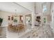 Open-concept dining room featuring modern chandelier and easy access to living spaces, perfect for entertaining at 220 Autumn Brook Dr, Canton, GA 30115