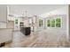 Modern kitchen features a center island, white cabinets, and ample natural light at 220 Autumn Brook Dr, Canton, GA 30115