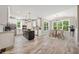 Modern kitchen with white cabinetry, stainless steel appliances, and a central island at 220 Autumn Brook Dr, Canton, GA 30115