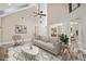 Bright living room boasts vaulted ceilings and neutral decor, creating an inviting and spacious atmosphere at 220 Autumn Brook Dr, Canton, GA 30115