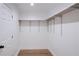 Spacious closet with ample shelving and wood floors at 1043 Smith Sw St, Atlanta, GA 30310