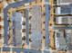 Aerial view of townhomes with community streets at 228 Dawson Dr, Woodstock, GA 30188