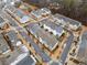Aerial view of townhomes and neighborhood landscape at 228 Dawson Dr, Woodstock, GA 30188
