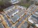 Aerial view of townhomes and community streets at 228 Dawson Dr, Woodstock, GA 30188