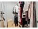Walk-in closet with ample shelving and hanging space at 228 Dawson Dr, Woodstock, GA 30188