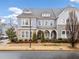 Stunning two-story home with gray siding and brick accents at 228 Dawson Dr, Woodstock, GA 30188