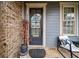 Inviting front entrance with a stylish door and landscaping at 228 Dawson Dr, Woodstock, GA 30188