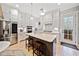 Updated kitchen featuring an island with quartz countertops and stainless steel appliances at 228 Dawson Dr, Woodstock, GA 30188