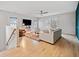 Bright living room with hardwood floors and a cozy sitting area at 228 Dawson Dr, Woodstock, GA 30188