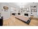 Open living room showcasing hardwood floors, fireplace, and built-in shelving at 228 Dawson Dr, Woodstock, GA 30188