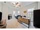 Home office features a desk, comfortable seating, and built-ins at 228 Dawson Dr, Woodstock, GA 30188
